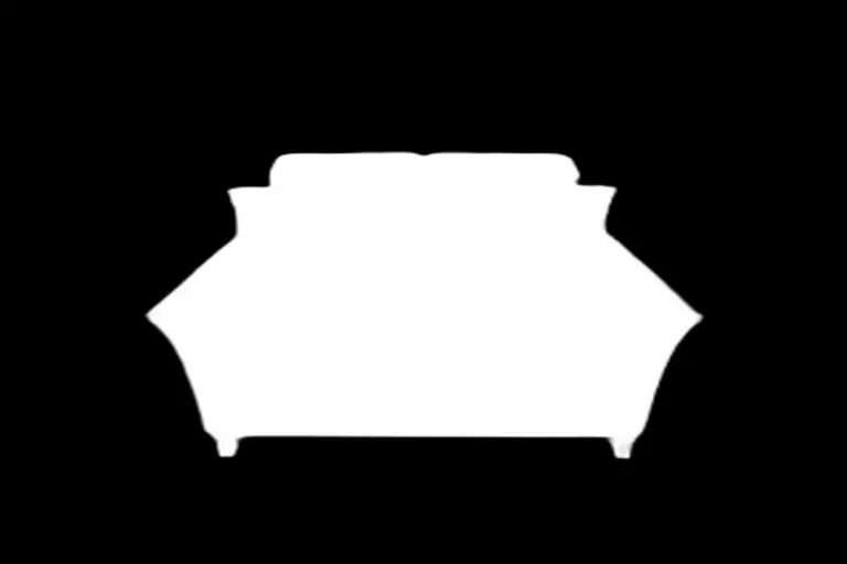 An image showing the subject of the generated image (sofa) masked out.